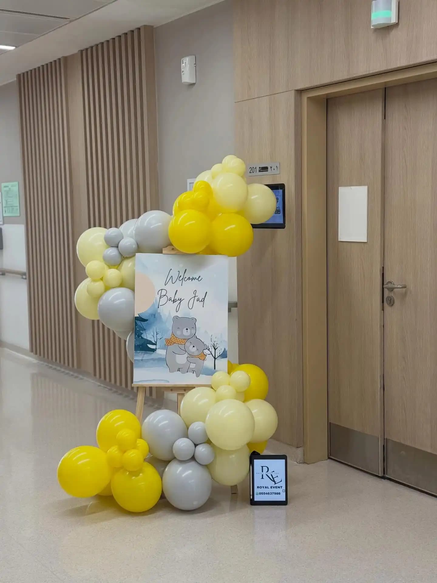 Hospital newborn decoration with pastel balloons and welcome baby setup